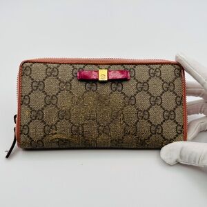 Gucci Zip Around Monogram Wallet